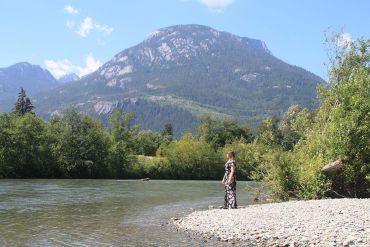 Dana overlooking Squamish scenery river and mountain